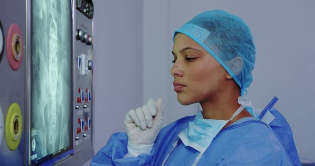 Radiologist examining x-ray image in medical facility - Download Free Stock Images Pikwizard.com