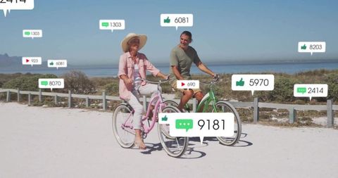 Social media influencer seniors enjoy biking by coastal trail
