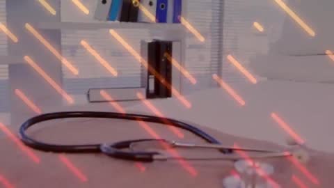 Stethoscope on Desk with Office Background: Medical Tool and Workspace