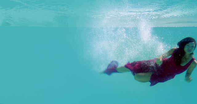 Woman in Red Dress Swimming Underwater with Splash - Download Free Stock Images Pikwizard.com