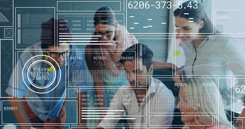 Team collaborating with data interface holograms at office