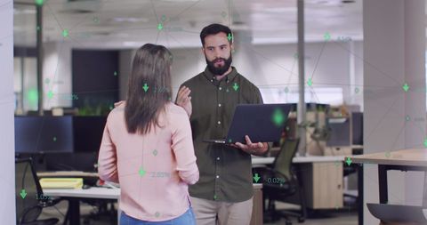 Business Colleagues Engaged in Data Analysis Discussion