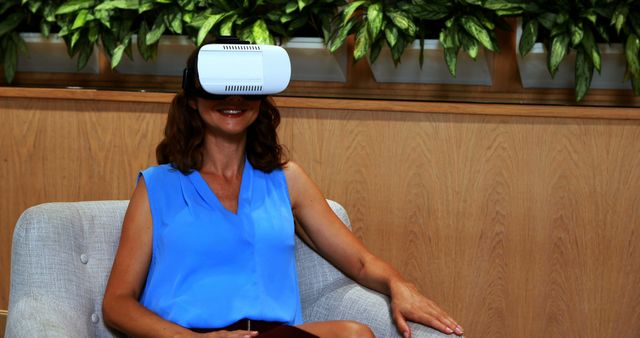 Woman Experiencing Virtual Reality at Home Relaxing Wear - Download Free Stock Images Pikwizard.com