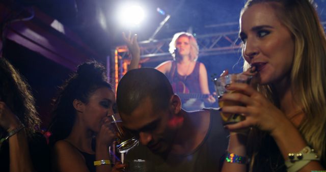 People Enjoying Nightclub Party with DJ Performing - Download Free Stock Photos Pikwizard.com