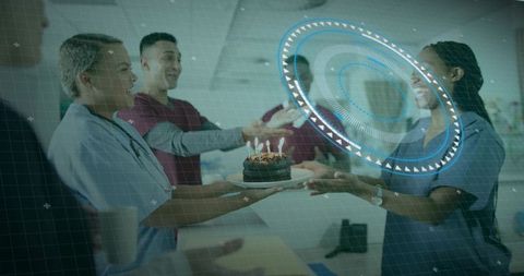 Hospital Team Celebrating with Cake in Corridor