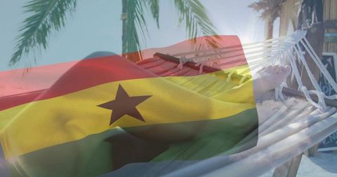 Ghana flag overlay on tropical beach hammock with woman in red swimsuit relaxing