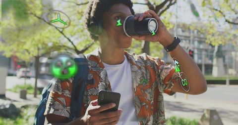 Urban commuter drinking coffee checking smartphone with AR overlays and headphones