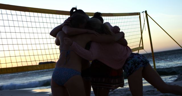 Group of Friends Hugging on Beach After Sunset Volleyball Game - Download Free Stock Images Pikwizard.com