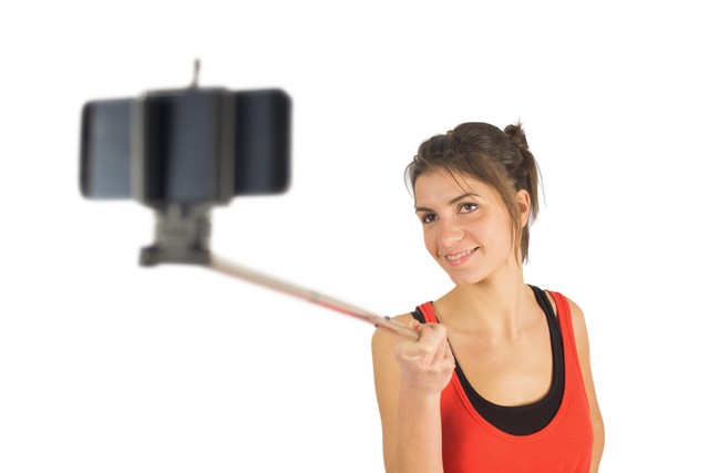 Happy Woman Using Selfie Stick with Transparent Background - Download Free Stock Videos Pikwizard.com