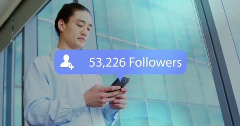 Businessperson Checking Social Media Followers on Smartphone - Download Free Stock Images Pikwizard.com