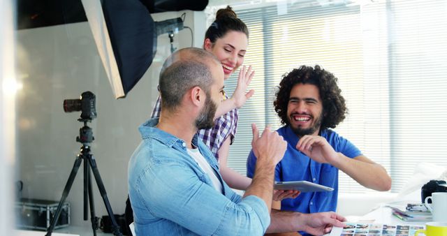 Creative Team Discussing Ideas at Modern Photography Studio - Download Free Stock Images Pikwizard.com