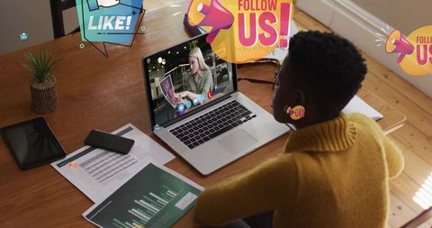 Entrepreneur Connecting Online Via Laptop in Home Office