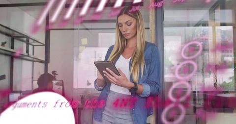 Businesswoman Analyzing Financial Data on Tablet in Modern Office