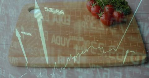 Food market data showing stock charts overlaying cutting board with tomatoes and herbs