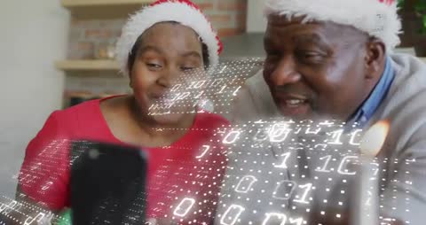 Family video calling during Christmas with holographic binary overlay and cozy candlelight