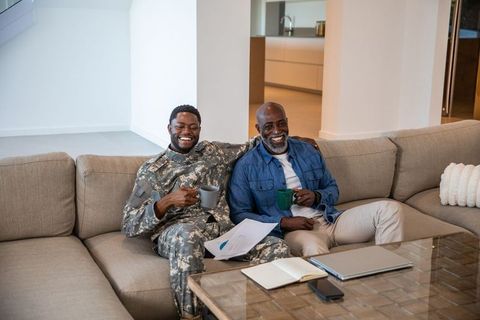 Father and Son Bonding at Home Over Coffee