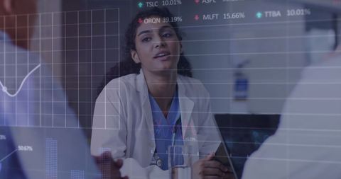 Healthcare Professionals Analyzing Data with Digital Graph Overlay - Download Free Stock Images Pikwizard.com