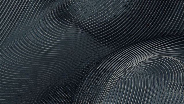 Abstract metallic surface with undulating grooves
