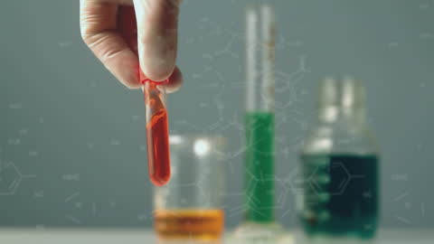Scientist Holding Test Tube in Modern Laboratory