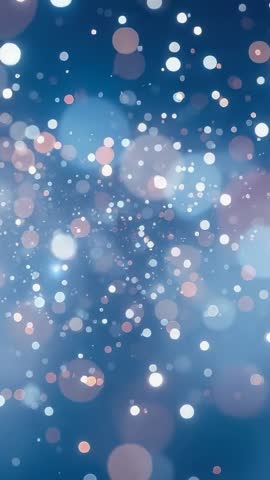 Vertical Bokeh Drift: Soft Blue Light Particles Drifting for Calm Background Video