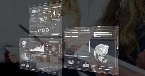 Interactive holographic data dashboards hovering over business meeting table with tablet stylus