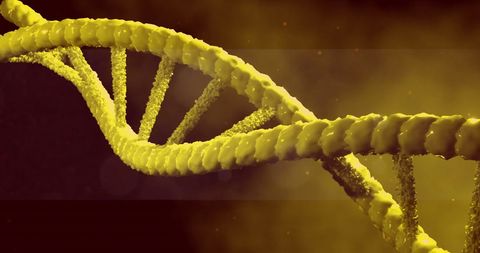 Close-up view of yellow dna strand with molecular detail