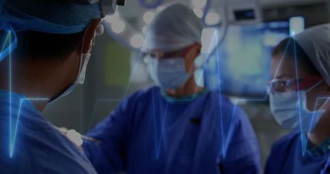 Medical Team Performing Surgery with Virtual Heartbeat Overlay - Download Free Stock Images Pikwizard.com