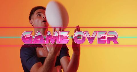 Surprised athlete in sports jersey reacting to game over text