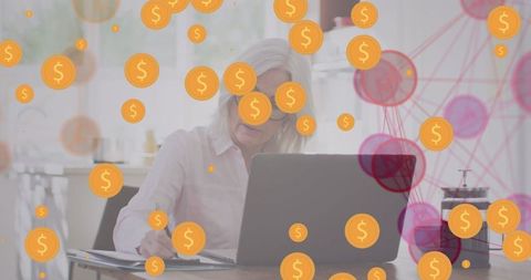 Senior woman handling taxes with digital finance graphics