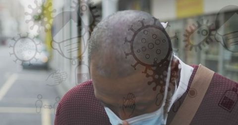 Man with Face Mask Sneezing on Urban Street Amid Pandemic Visuals