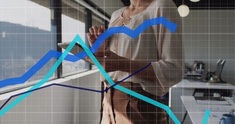 businesswoman analyzing graphs on digital tablet in office - Download Free Stock Images Pikwizard.com