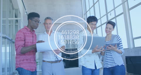 Diverse Team Discussing and Collaborating in Office Setting