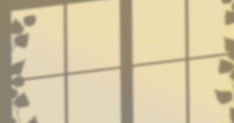 Window shadow pattern with leaves on yellow background