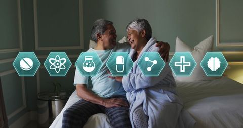 Senior Couple Embracing with Medical Research Icons Overlay