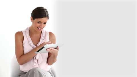 Businesswoman Engaging with Modern Tech on Tablet
