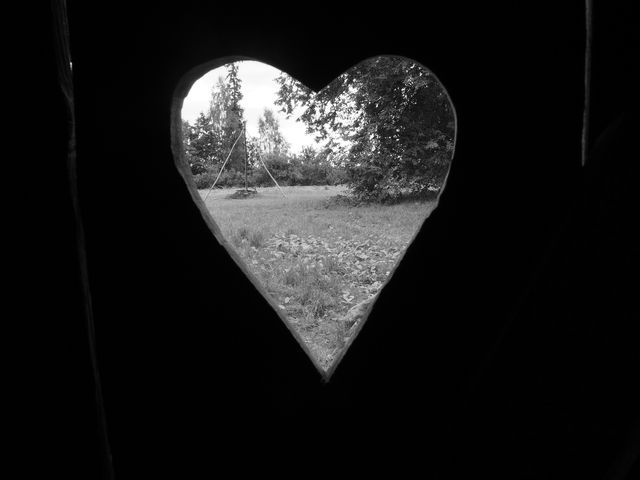 Heart-Shaped Window Overlooking Lush Garden Landscape - Download Free Stock Photos Pikwizard.com