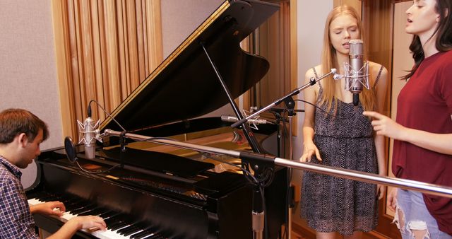 Musicians collaborating in a professional recording studio with a piano and microphones. Pianist playing grand piano while two vocalists sing. Perfect for music industry websites, recording studio promotions, music creation tutorials, and collaborative performance illustrations.