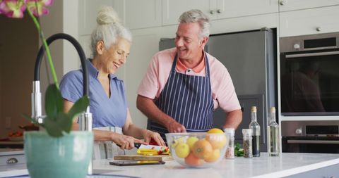 Senior Couple Cooking Together in Modern Kitchen - Download Free Stock Images Pikwizard.com