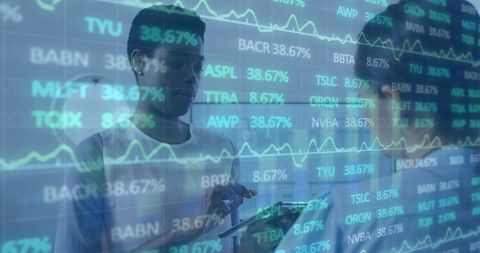 Diverse Executives Analyzing Cryptic Stock Market Data in Office - Download Free Stock Images Pikwizard.com