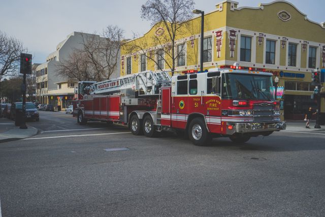 Downtown areas are important zones for emergency services. Perfect for articles on city infrastructure, emergency services, firefighting operations, and urban safety measures. Also suitable for educational materials on fire safety and public awareness campaigns.