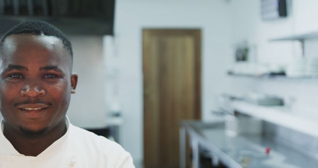 Professional Chef Smiling in Modern Kitchen - Download Free Stock Images Pikwizard.com