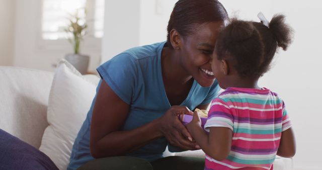 Mother and Daughter Interacting and Laughing Together - Download Free Stock Images Pikwizard.com