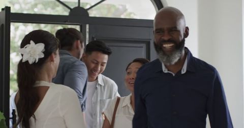 Joyful Gathering of Friends at Home During Wedding Celebration