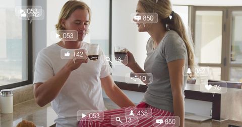 Caucasian couple enjoying coffee with social media interactions overlay