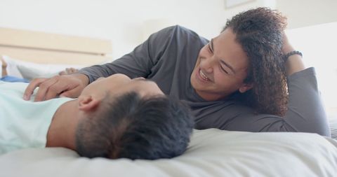 Happy Diverse Gay Male Couple Relaxing at Home - Download Free Stock Images Pikwizard.com