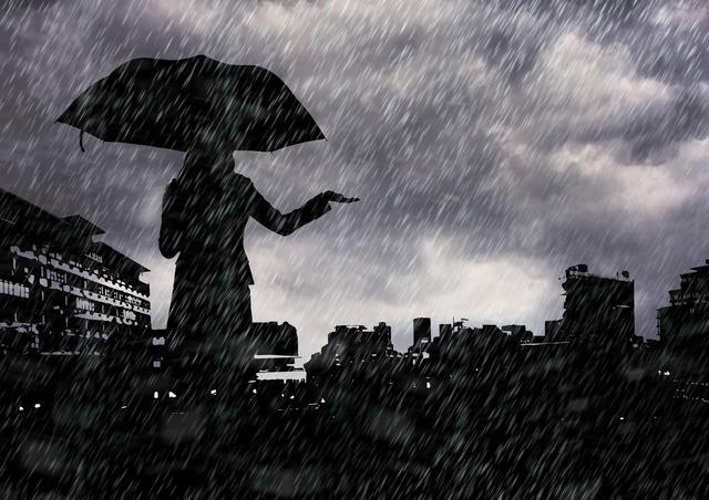 This visually striking image depicts a silhouette of a woman holding an umbrella against a rainy cityscape. The dramatic rain and city skyline could make this image suitable for use in articles or advertisements addressing urban life, weather forecasts, or storylines related to rainy nights in the city. It can also be utilized for artistic purposes or mood-setting environments in presentations, blogs, and websites.