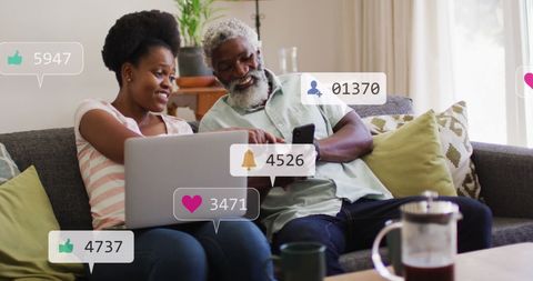 African American Couple Engaging with Social Media Icons