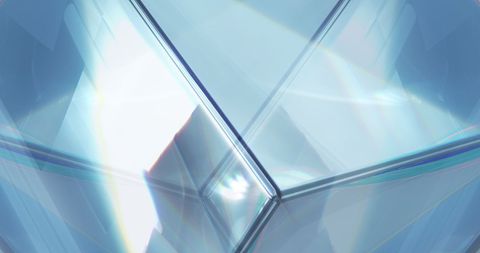 Transparent cube with radiant prismatic lights reflecting