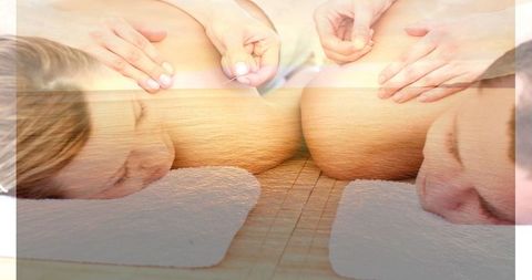 Couple Relaxing with Massage and Serene Seascape Overlay