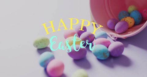 Colorful easter eggs with happy easter text and pink bucket